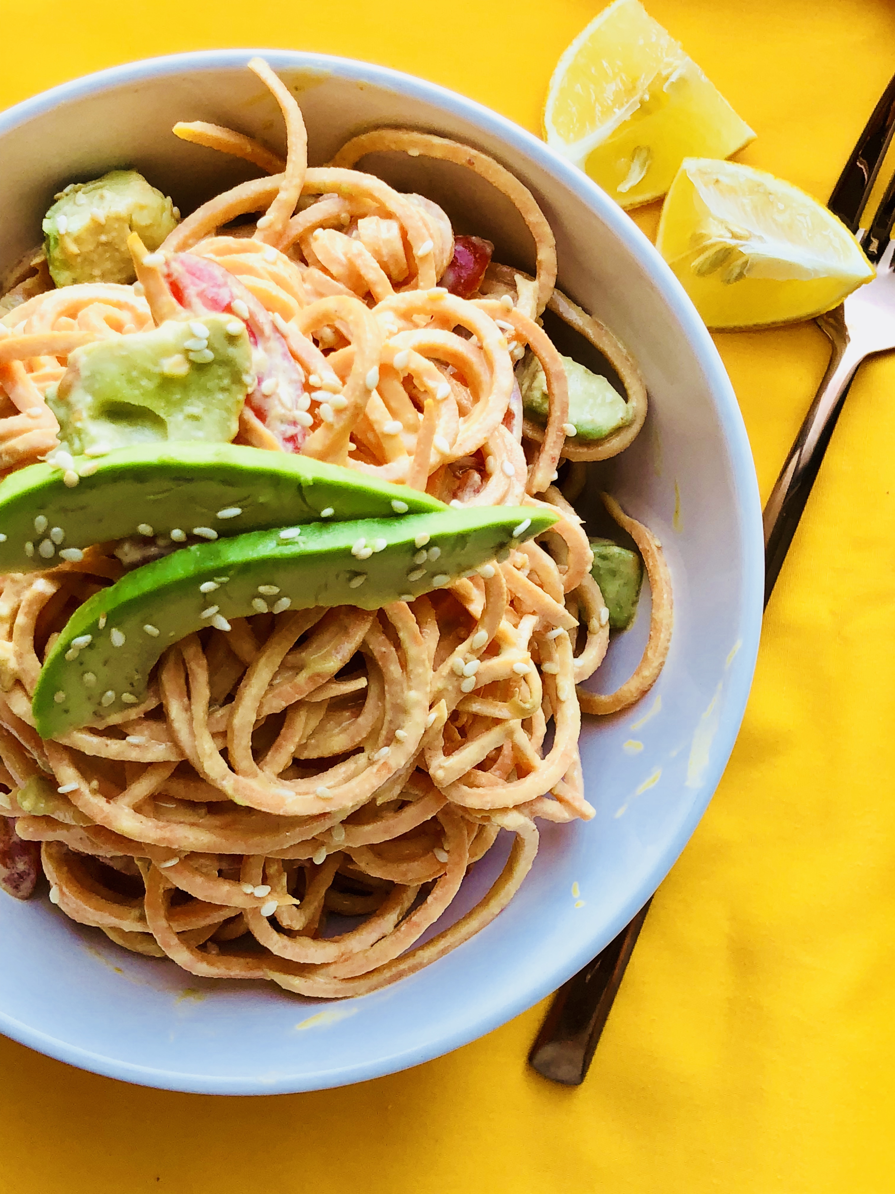 Spiralized Sweet Potato Noodles with Pesto & Coconut Bacon