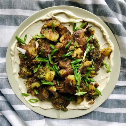 Smashed Crispy Potatoes with Calabrian Chili Basil Pesto & Lemon “Cream”